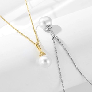 Elegant sterling silver necklace with natural pearl and sparkling diamond pendant