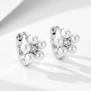 Elegant S925 sterling silver flower earrings featuring white pearls and zircon accents