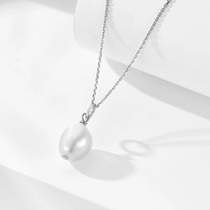 Elegant S925 silver necklace with a natural freshwater baroque pearl on a white background