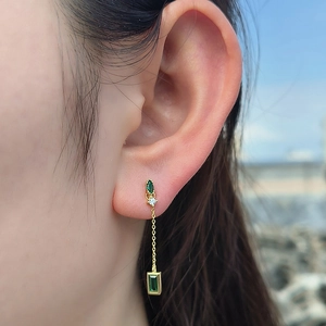 S925 silver emerald zircon tassel earrings featuring long chains and green gemstones
