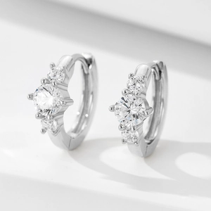 S925 sterling silver huggie earrings featuring three sparkling zircon stones in a claw setting