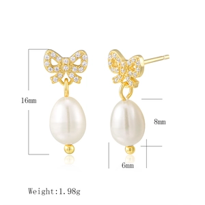 Détail des boucles d'oreilles nœud en perles avec dimensions et poids de 1,98g
