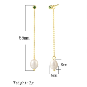 Detail of S925 silver long tassel earrings with 55mm drop length and natural pearls
