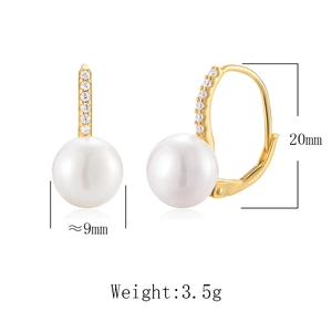 Detail of 9mm round freshwater pearl earrings with gold hooks and micro-inlaid stones