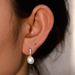 Elegant S925 silver freshwater pearl earrings with three zircon stones on gold base