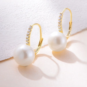 Elegant S925 silver leverback earrings with gold finish and white freshwater pearls