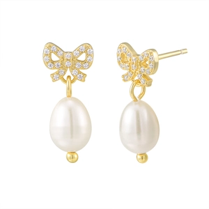 Boucles d'oreilles nœud en argent 925 doré avec diamants pavés et perles d'eau douce