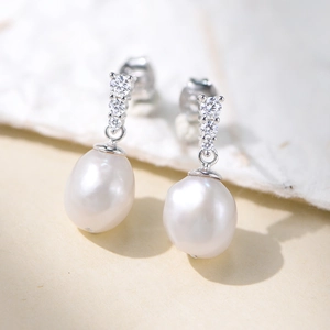 Elegant s925 silver earrings with freshwater pearls and sparkling zircon accents