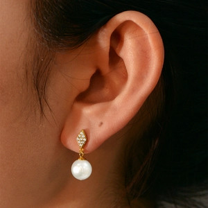 Elegant S925 silver geometric diamond stud earrings with white pearl pendants on ear