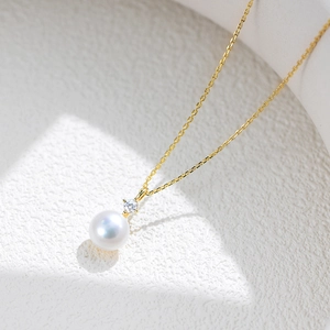Elegant S925 silver necklace with white pearl and sparkling diamond pendant on gold chain