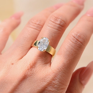 S925 sterling silver ring with oval ice cut cubic zirconia and gold plated wide band