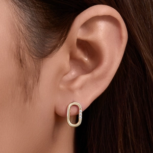 Minimalist S925 sterling silver oval hoop earrings with gold plating and three small diamonds