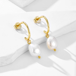 Elegant gold S925 sterling silver earrings featuring natural baroque freshwater pearls