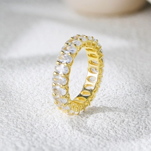 Elegant gold S925 silver eternity ring with oval-cut cubic zirconia in claw setting