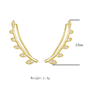 Detail view showing 24mm gold leaf crawler earrings with zircon inlays weighing 1.4g