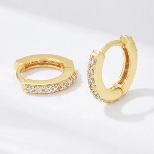 Elegant gold S925 silver huggie earrings with sparkling round cubic zirconia stones
