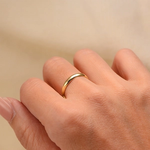 Minimalist 14K gold plated 3mm s925 silver band ring shown on model's finger