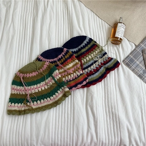 Handmade crochet cotton striped bucket hat with floral trim and fringe detailing