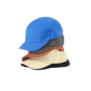 Five-panel cotton twill camp caps in various colors stacked on white background