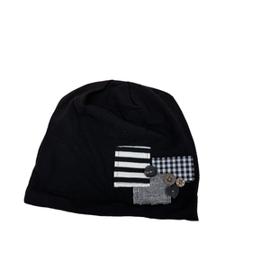 Unisex black slouchy beanie hat featuring creative patchwork and decorative buttons