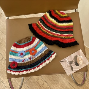 Handmade striped crochet bucket hats with floral embroidery and wavy brim for women