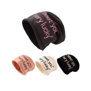 Knit slouchy beanie with embroidered letters in grey pink beige and black colors