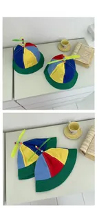 Detail of kids colorful propeller bucket hat with red blue yellow green patchwork canvas