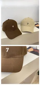 Detailed embroidery of the number seven on a cotton baseball cap with stitch detail