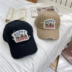 Retro distressed cotton baseball cap with Happy Camper patch in black and khaki