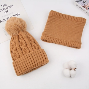 Chunky cable knit winter hat and neck warmer set with faux fur pom in ginger yellow