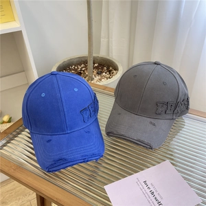Distressed vintage baseball cap with PEACE embroidery in blue and charcoal grey tones