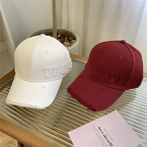 Distressed cotton baseball caps in white and burgundy with PEACE letter embroidery
