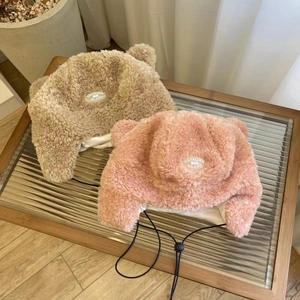 Winter plush trapper hats with bear ears and Catalina embroidery in brown and pink