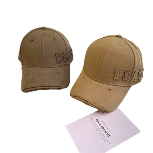 Vintage distressed baseball caps with 'PEACE' embroidery in brown and khaki colors
