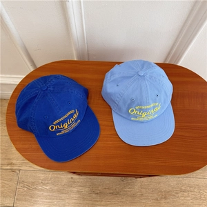 Retro two-tone flat brim baseball caps in royal and light blue with yellow embroidery