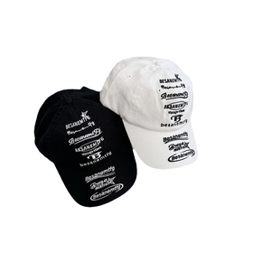 Retro hip-hop baseball caps in black and white with vintage streetwear logo prints