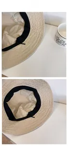 Detail of adjustable inner drawstring and sweatband in beige textured bucket hat