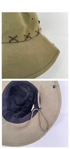 Detail of army green safari hat with metal air vents, mesh lining and adjustable chin strap