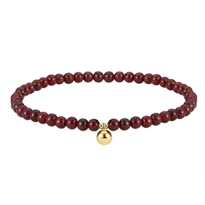 Elegant S925 sterling silver anklet with deep red garnet beads and a polished gold sphere