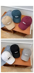 Detail of embroidered Consice logo on a cotton baseball cap in various classic colors