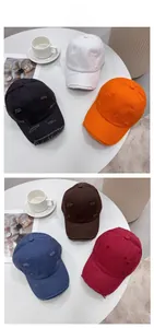 Detail view of vintage distressed baseball caps with ripped edges in six assorted colors