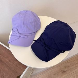 Lightweight breathable baseball cap with bow tie detail in purple and navy blue
