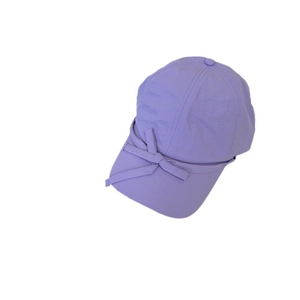 Stylish light purple baseball cap featuring a decorative bow tie and breathable fabric