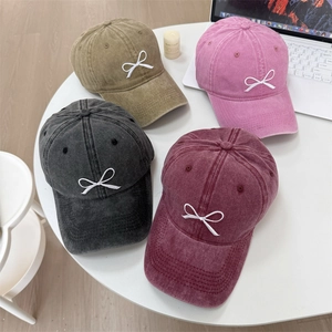 Distressed washed denim baseball caps with bow embroidery in four assorted colors
