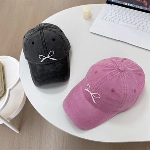 Vintage washed denim baseball caps with embroidered bow in black and pink purple
