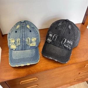 Vintage washed denim baseball caps with distressed ripped details and LIFE embroidery
