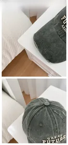 Close-up of distressed brim and 3D embroidery on washed cotton baseball cap