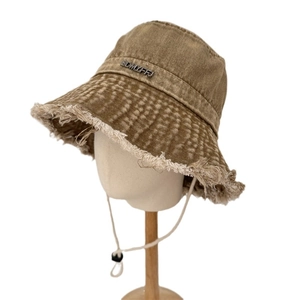Vintage frayed edge denim bucket hat in khaki with adjustable drawstring for women