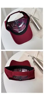 Detail view of burgundy baseball cap showing internal structure and adjustable strap