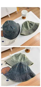 Detail showing deep blue and vintage green washed denim bucket hats with wide brim design